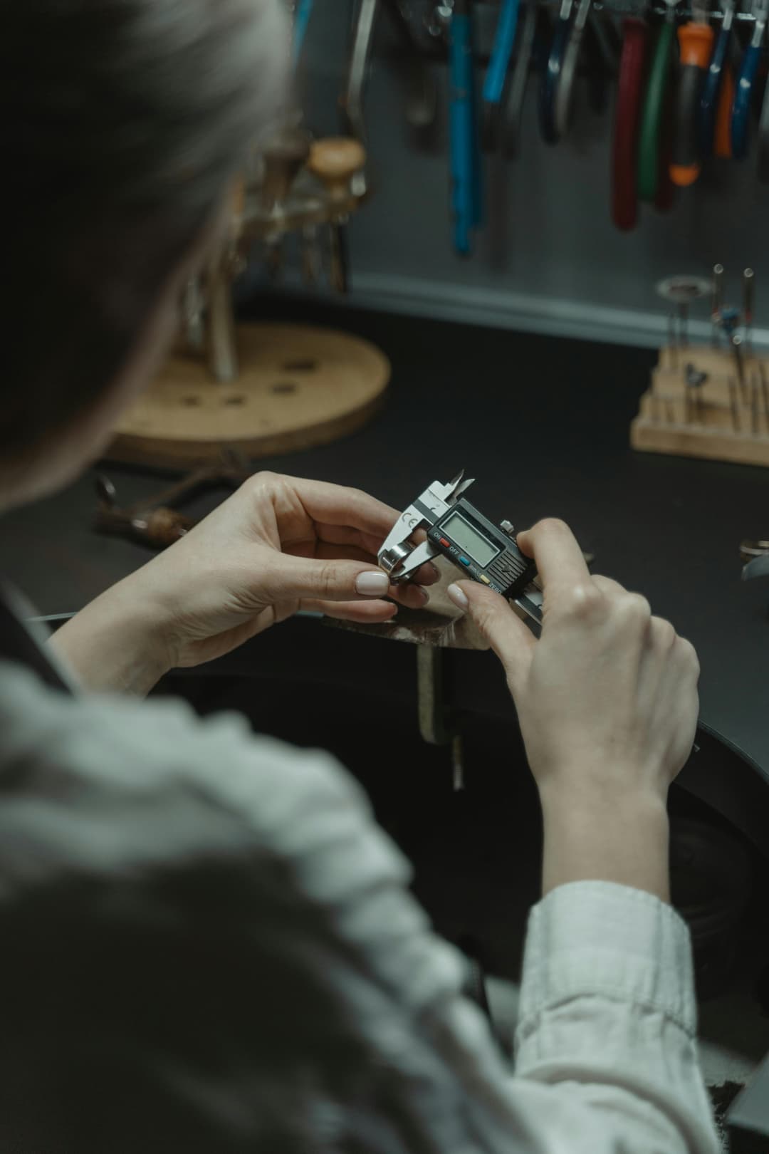 a woman checking the quality of her work